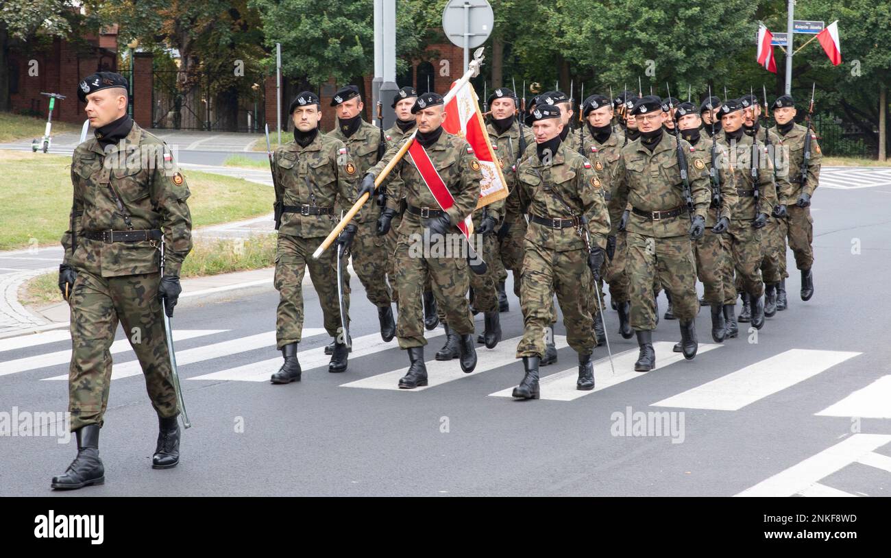 Soldiers from V Corps, members of the Polish armed forces, and Poznan community members participate in a Polish Armed Forces Day parade on 14 August 2022, at Armia Poznań Memorial site, in Poznan, Poland. Events such as these, further strengthen bonds between servicemembers and build trust among the local civilian community. Stock Photo