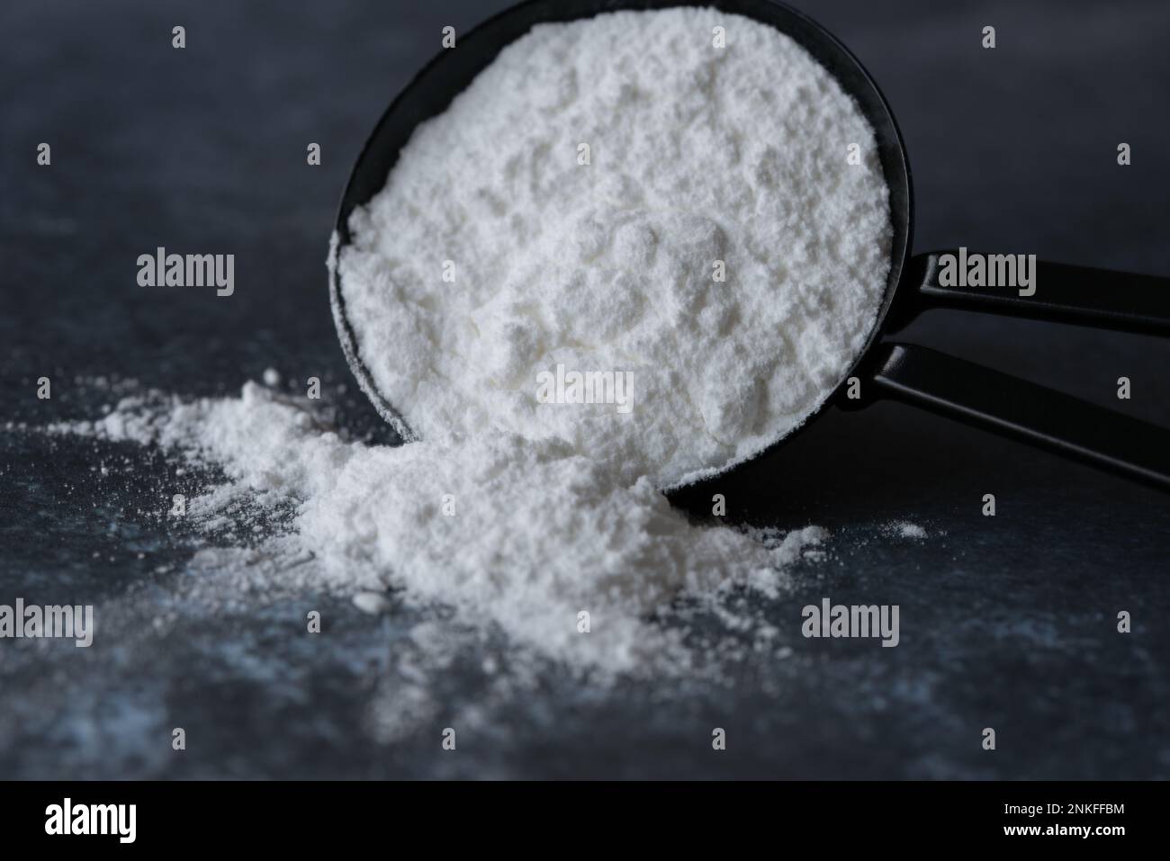 Baking Powder Spilled from a Teaspoon Stock Photo Alamy