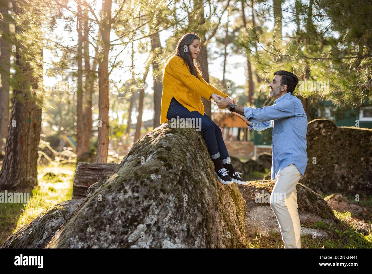 Affectionate mature couple holding hands outdoors Stock Photo