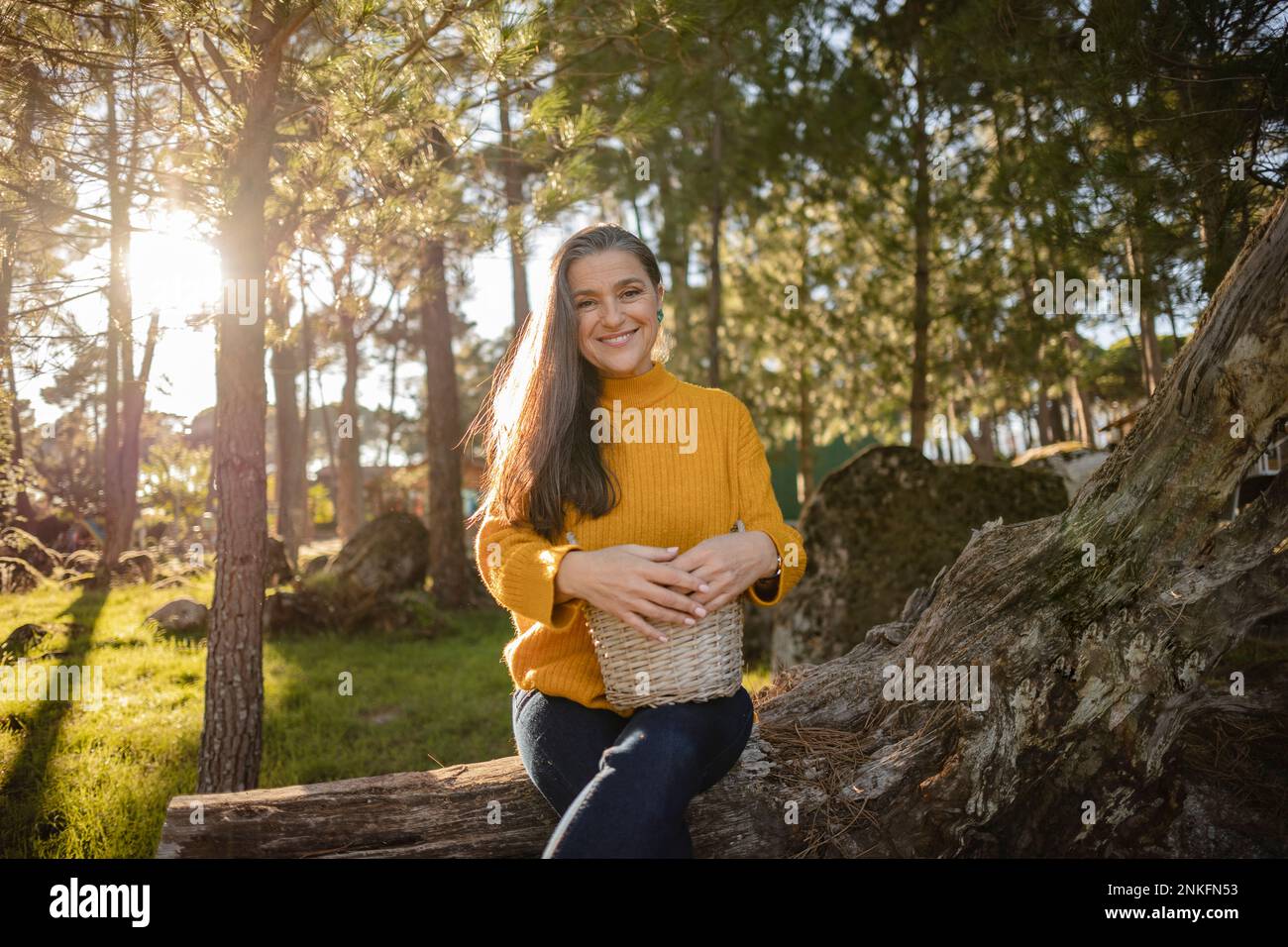 Woman with a wicker basket hi-res stock photography and images - Alamy