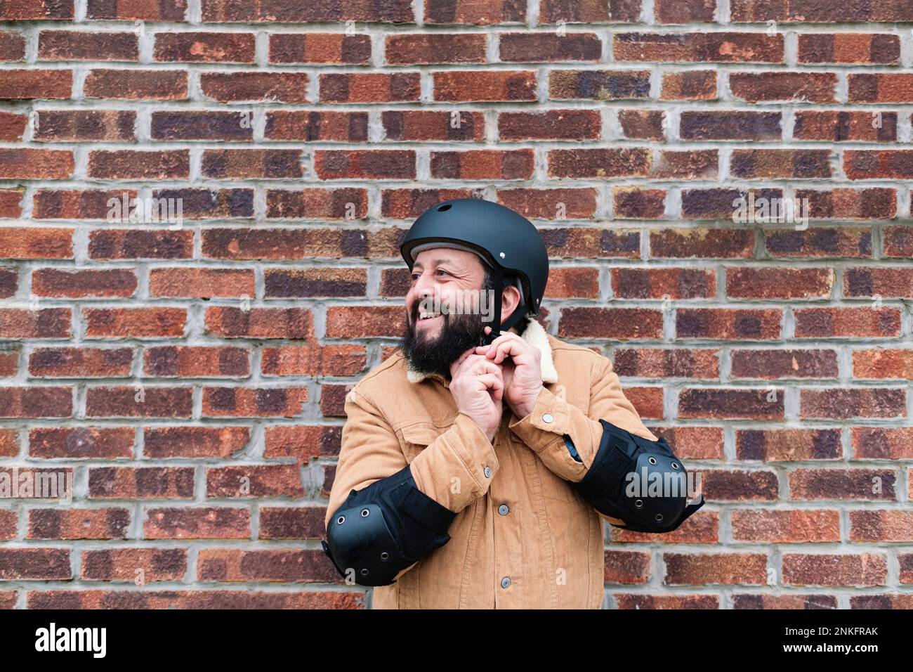 Man wearing protective helmet hi-res stock photography and images - Alamy