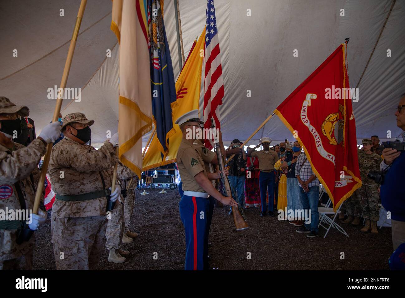 Marines with Bulk Fuel Company, 6th Engineer Support Battalion, 4th Marine Logistics Group, and The Upper Fruitland Veteran Color Guard, present the Marne Corps and Navajo Colors during the 80th anniversary of the founding of the Navajo Code Talkers at Tse Bonito, N.M., Aug. 14, 2022. In 1982, U.S. President Ronald Reagan designated Aug. 14 as National Navajo Code Talkers Day. Proclamation 4954 encouraged all Americans to remember and honor the contributions of the Navajo Nation and all Native Americans who gave of their  special talents and their lives in service of our country so that others Stock Photo