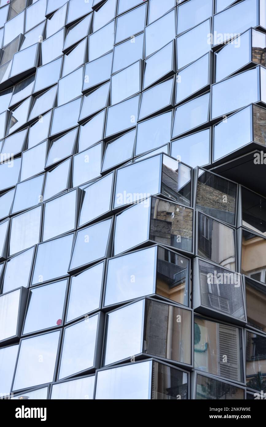 View of Traditional Haussmann Apartment Buildings Reflected in the Glassy ...