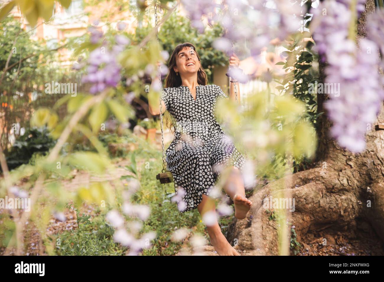 Women swinging on swing hi-res stock photography and images - Alamy