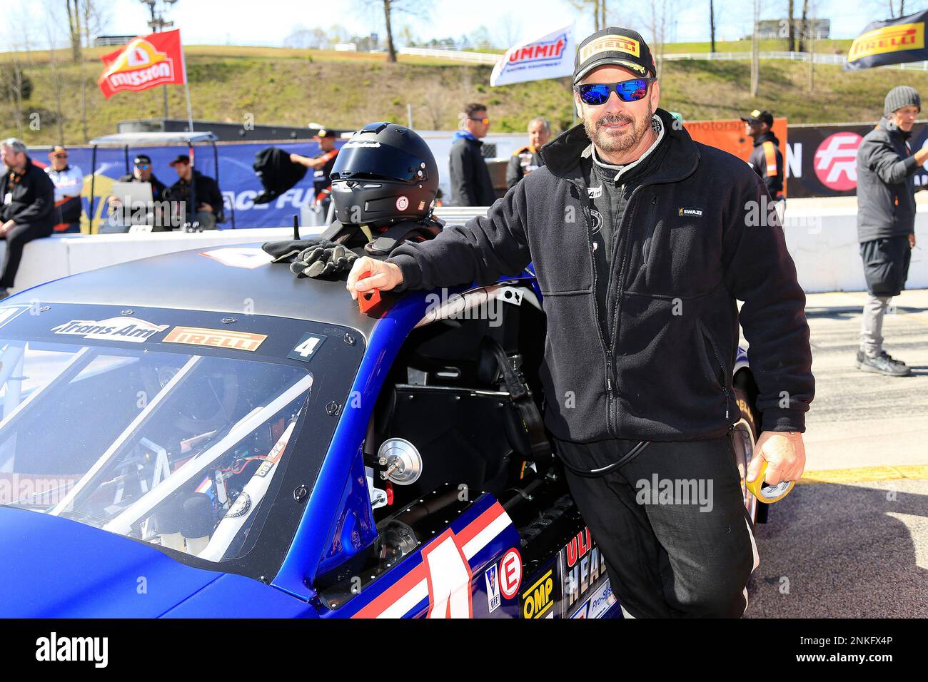 BRASELTON, GA MARCH 27 Wally Dallenbach, Jr. poses with his Ford
