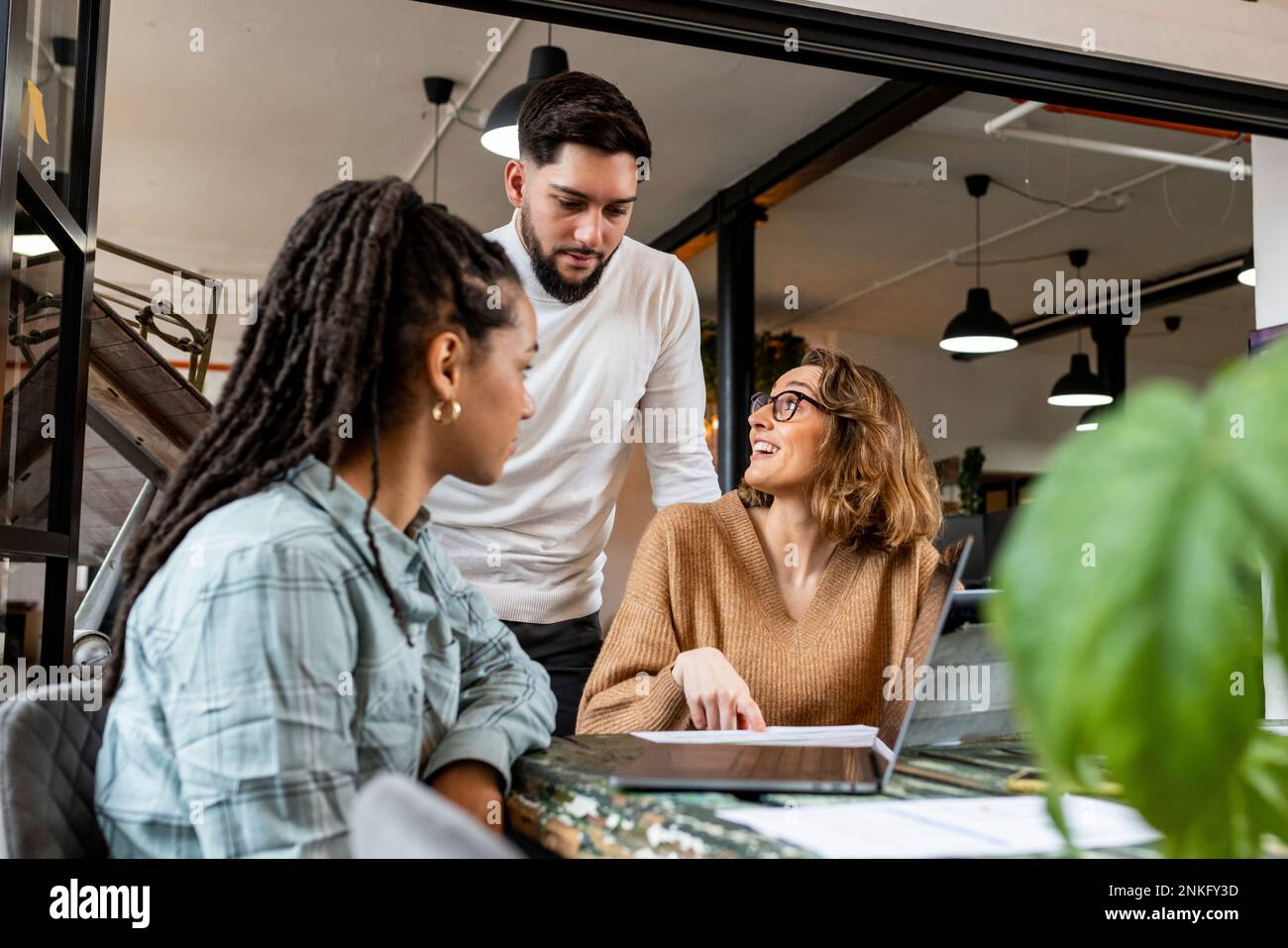 Sitting coworkers in office hi-res stock photography and images - Alamy