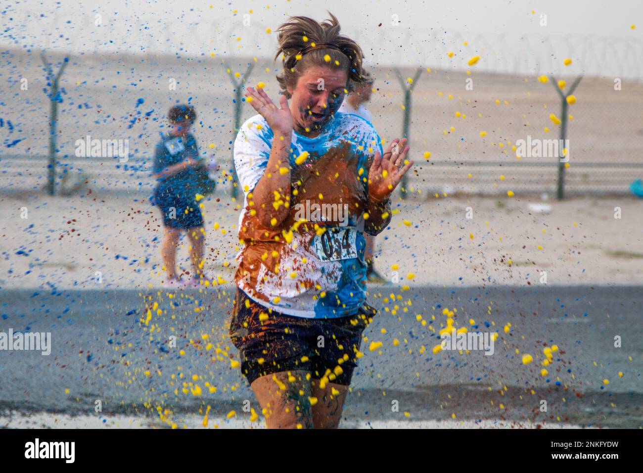 Soldiers across Camp Arifjan, Kuwait took part in a 5k color run hosted by the MWR on Aug. 14, 2022. Stock Photo