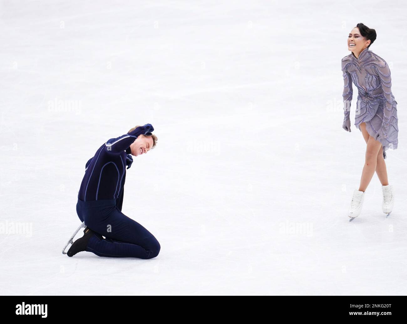 Unite States of America's Madison CHOCK and Evan BATES react after
