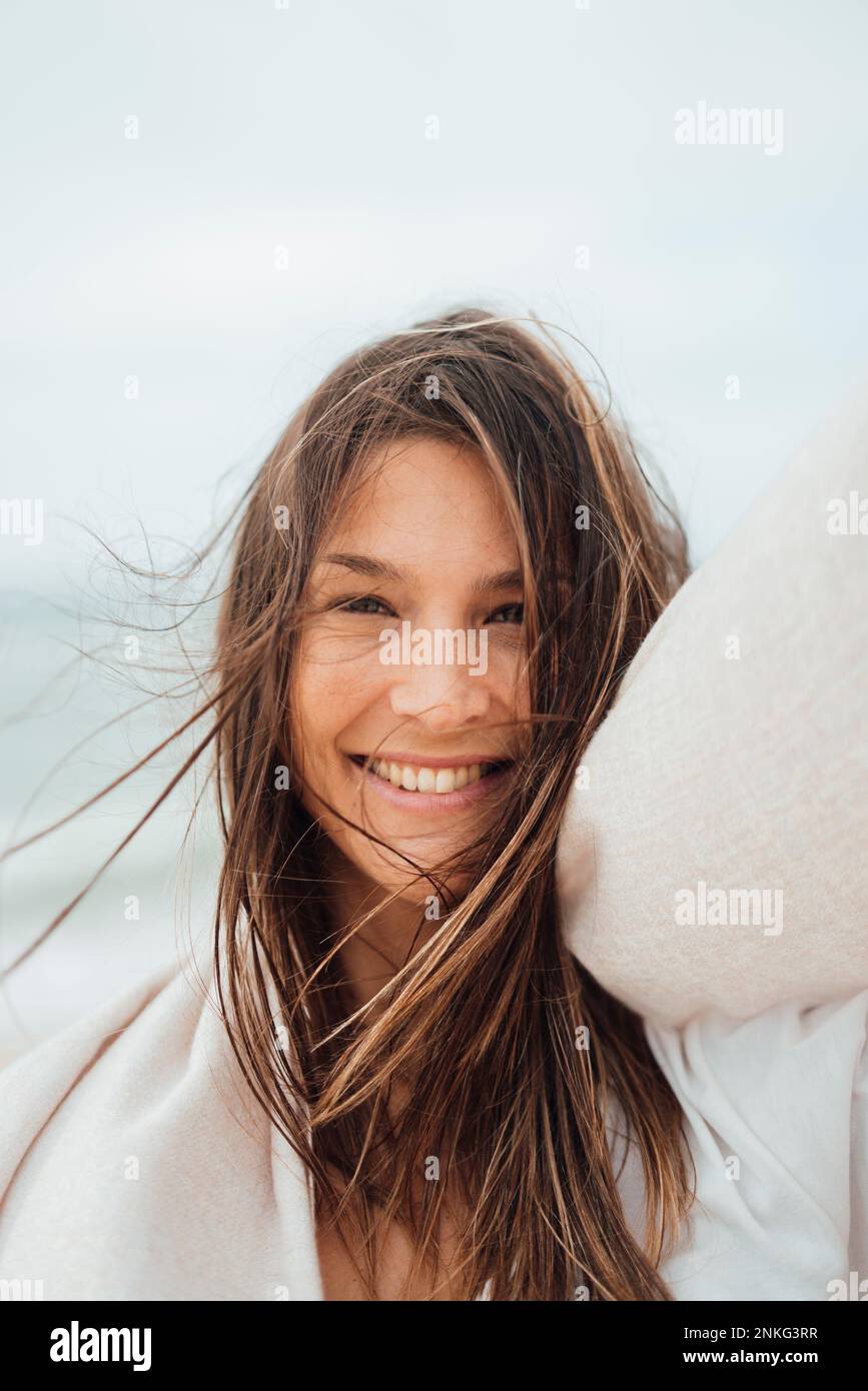 Happy brunette woman with long hair Stock Photo