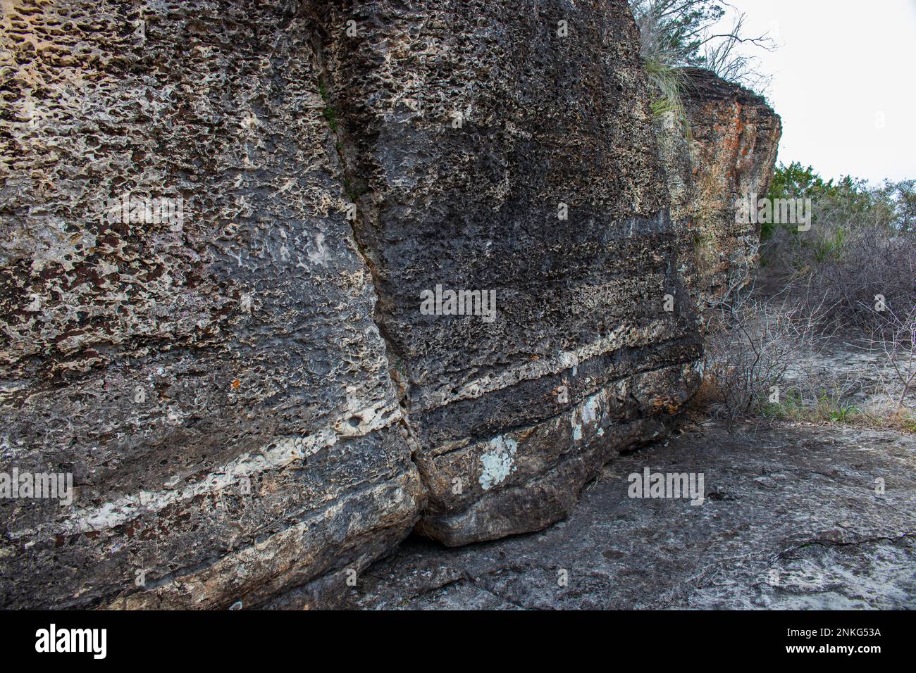 Geological granite stone rock wall in Pedernales Falls State Park as