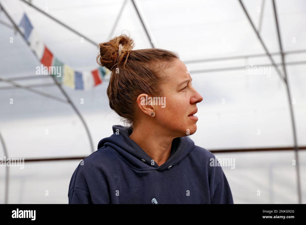 Aardema harvests spring onions at BroadFork Farms in Moseley, Va