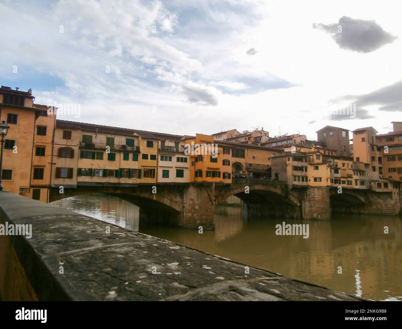 Famous ponte vecchio bridge over the Arno River in Florence, Italy Stock Photo