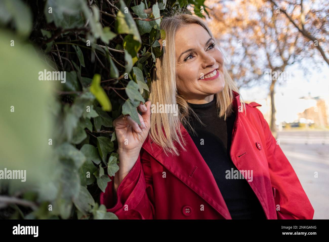 Smiling thoughtful mature woman hi-res stock photography and images - Alamy