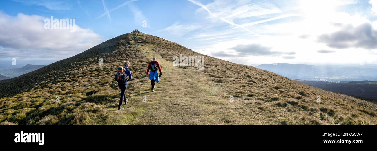 Mother and son hiking on mountain, Sugar Loaf, Brecon Beacons, Wales Stock Photo