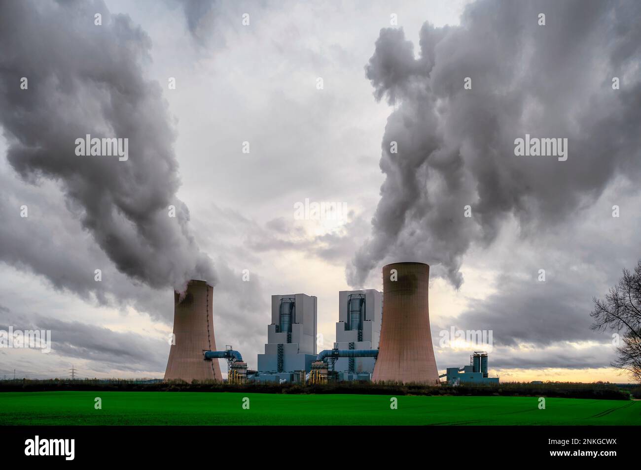Germany, North Rhine Westphalia, Grevenbroich, Water vapor rising from cooling towers of lignite-fired power station Stock Photo
