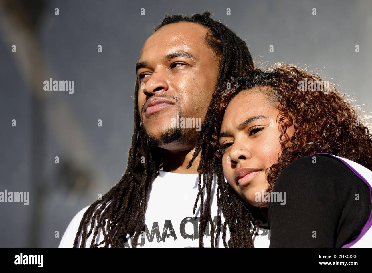 Micheal Greer, who was on the platform with Oscar Grant, hugs 