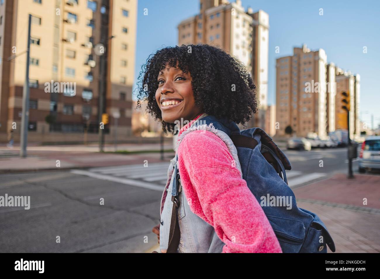 African american woman backpack standing hi-res stock photography and ...
