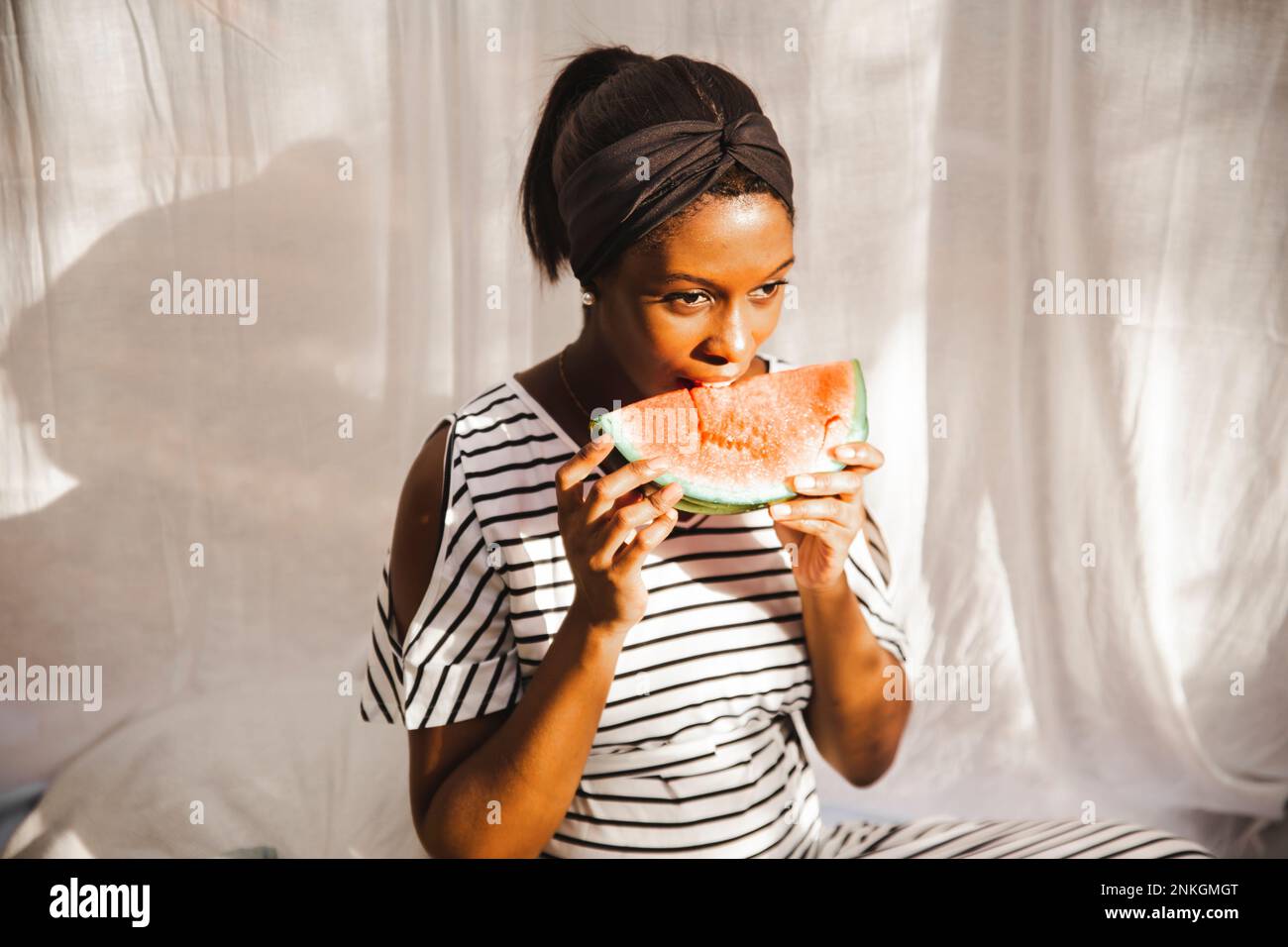 Pregnant eating african hi-res stock photography and images - Alamy