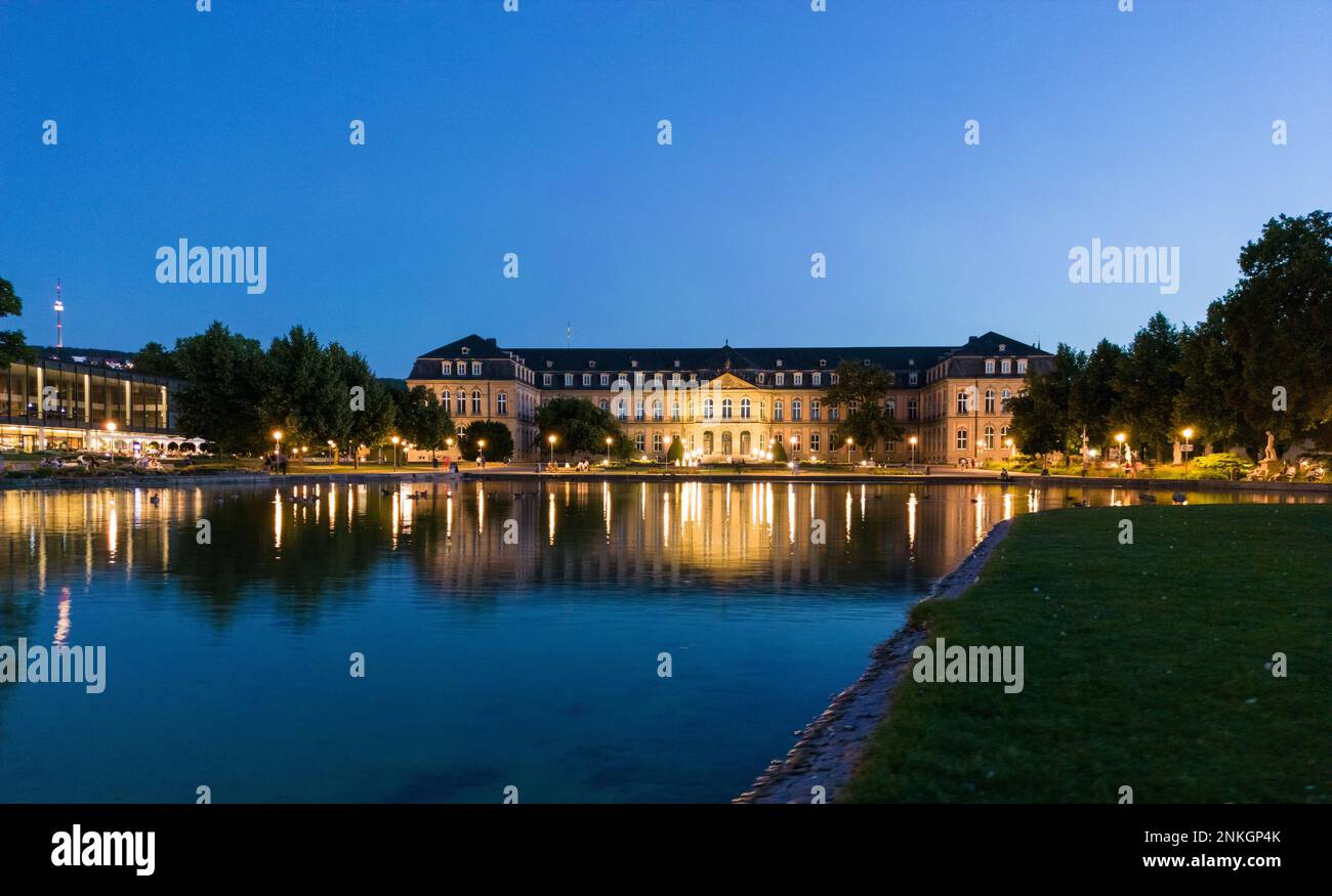 New Palace in front of Eckensee lake under sky at night, Stuttgart ...