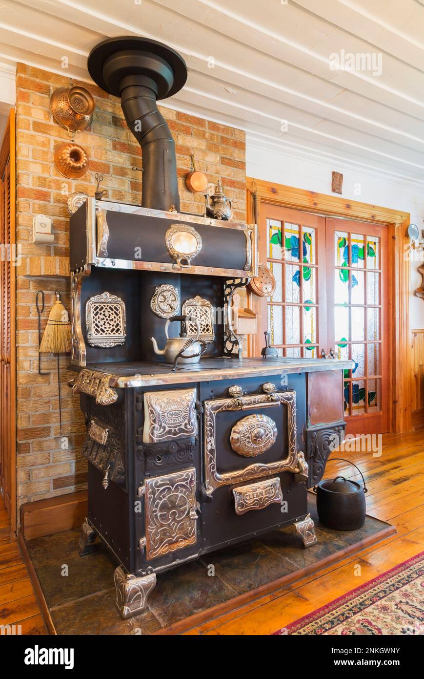 1913 McClary Famous Kootenay Range wood burning stove in dining room
