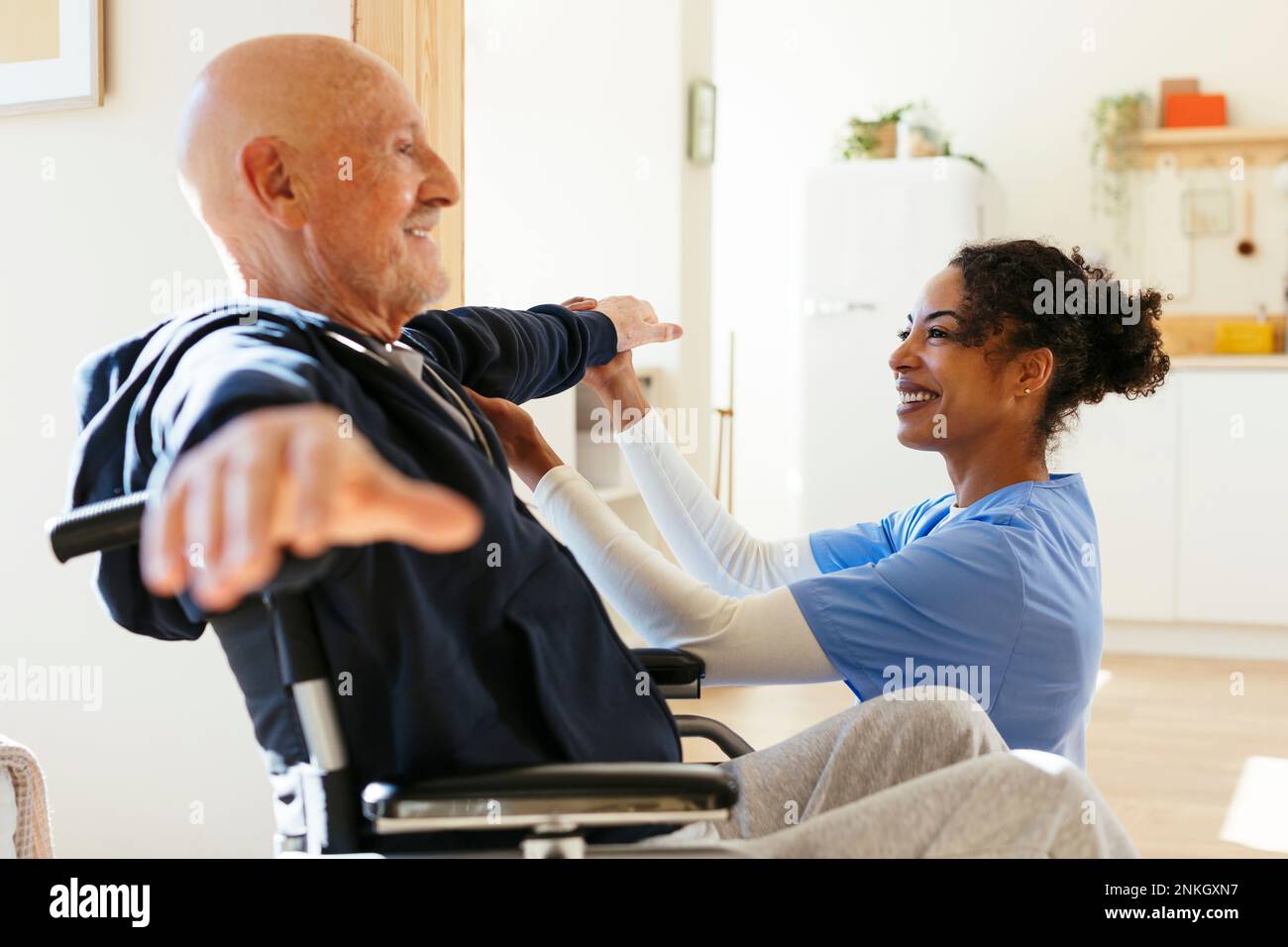 Man stretching arms african hi-res stock photography and images - Alamy