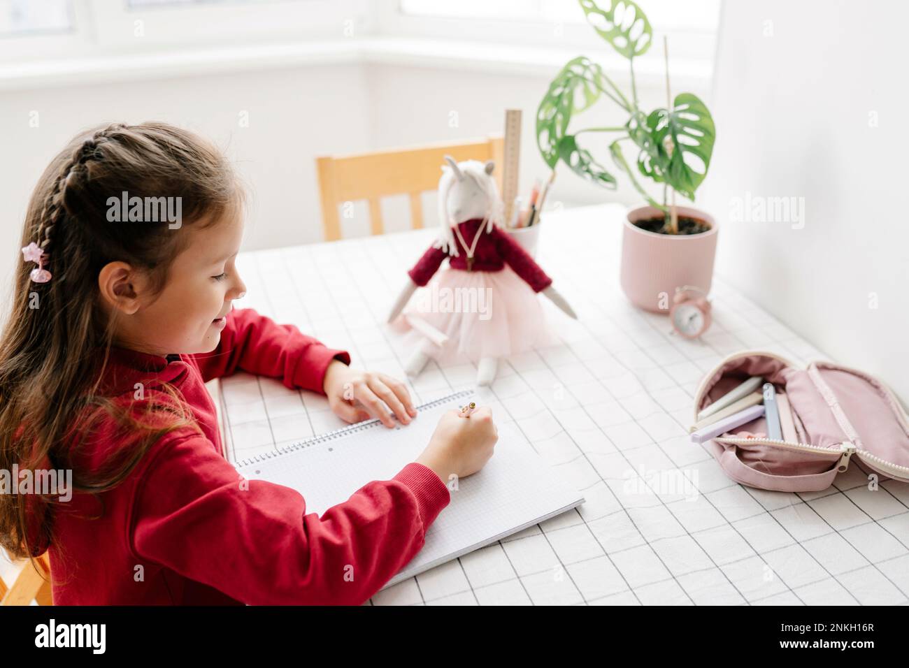 Female note book writing hi-res stock photography and images - Alamy