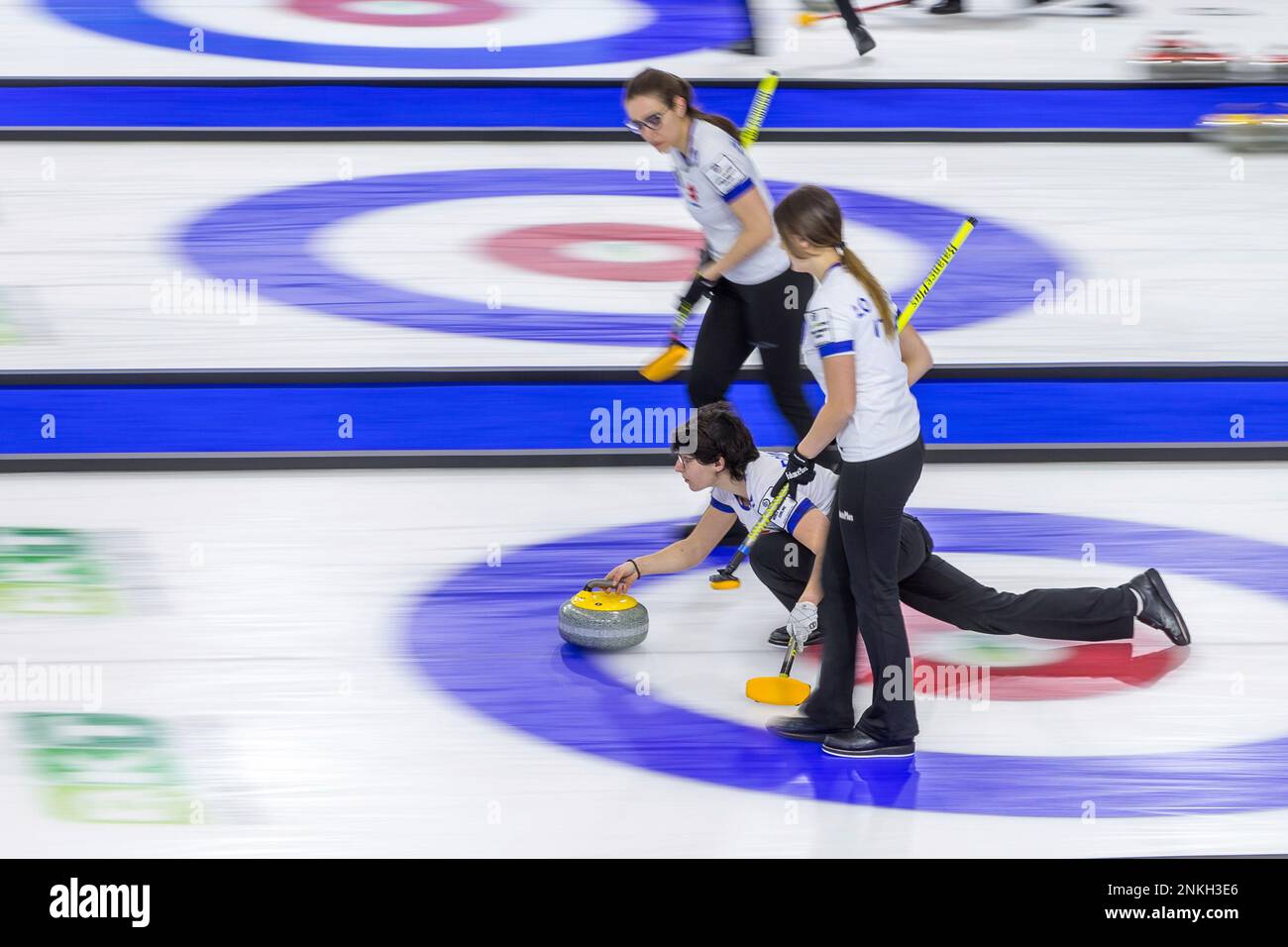 Italy second Angela Romei throws a stone while third Marta Lo Deserto ...