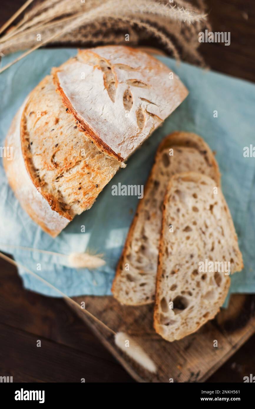 Freshly baked sourdough bread on napkin Stock Photo