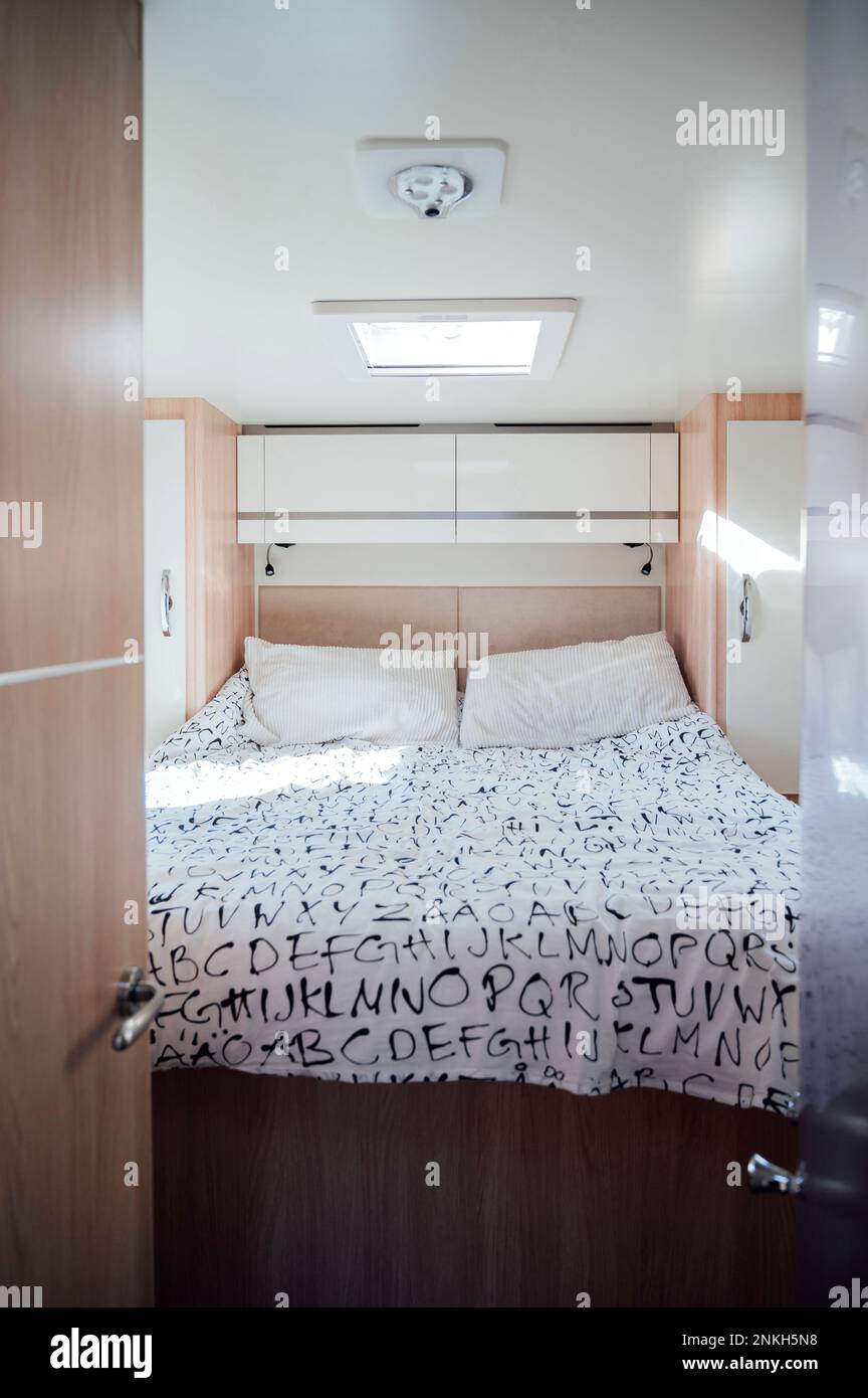 Interior of bed in camper van Stock Photo Alamy