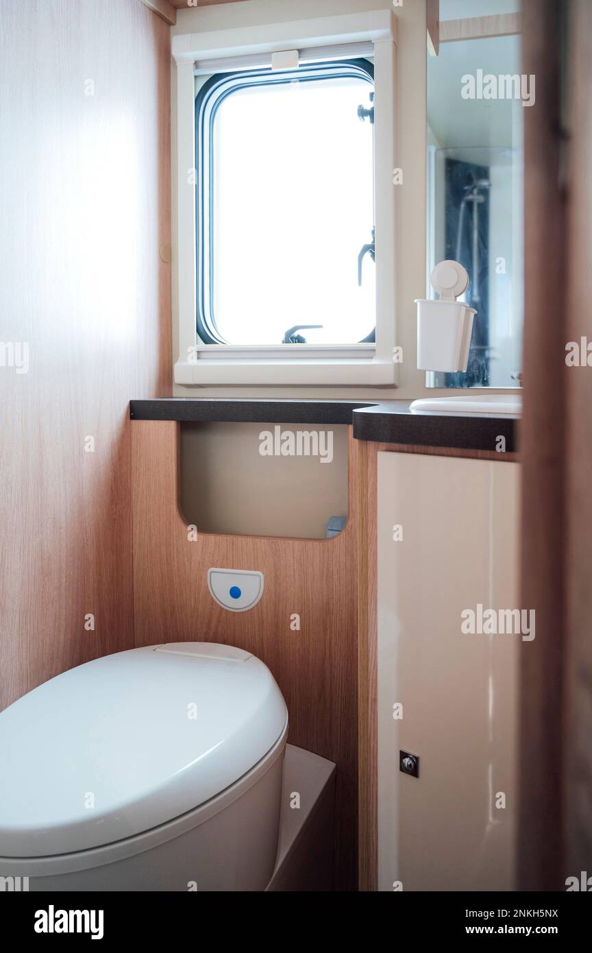 Closed toilet bowl in camper van bathroom Stock Photo Alamy