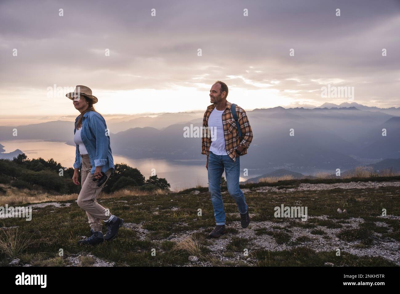 Man and woman hiking mountain hi-res stock photography and images - Alamy