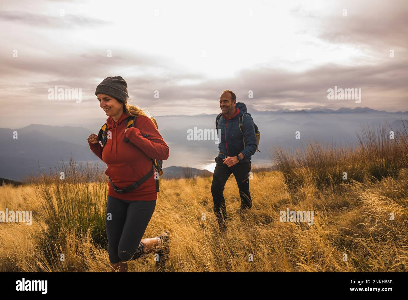 Man and woman hiking mountain hi-res stock photography and images - Alamy