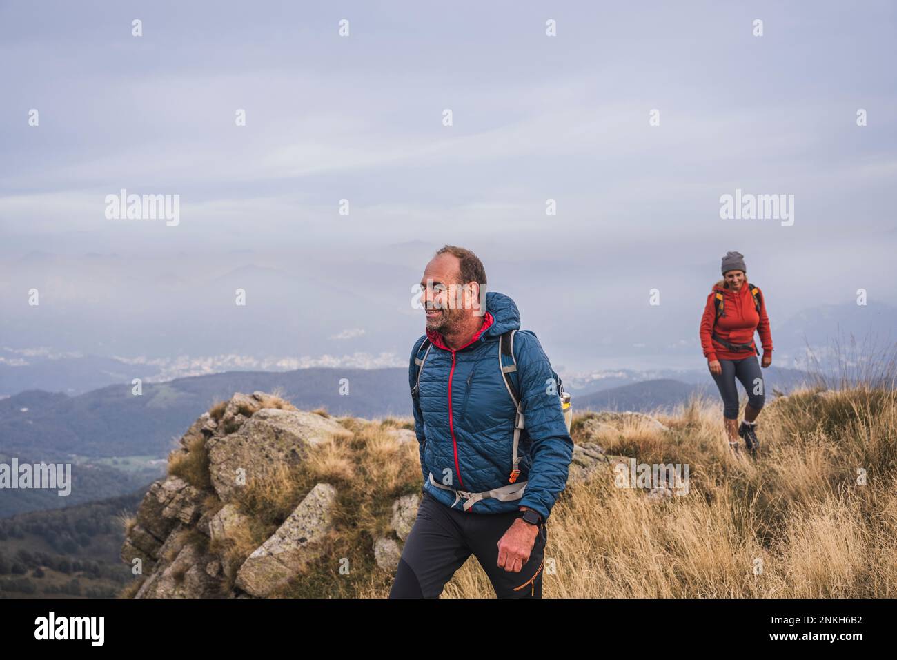 Man and woman hiking mountain hi-res stock photography and images - Alamy