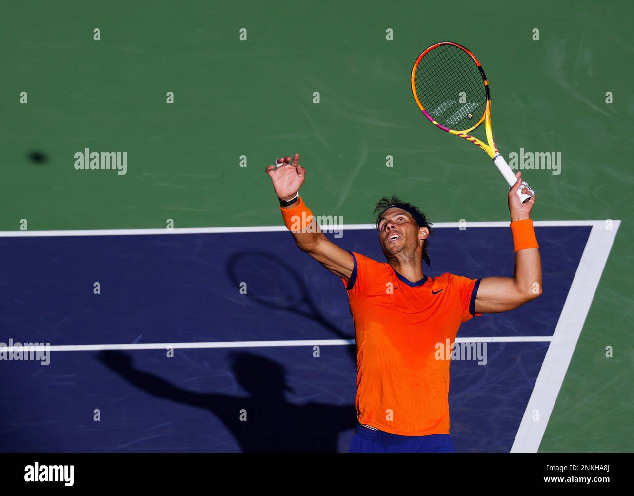 March 20, 2022 Rafael Nadal of Spain serves against Taylor Fritz during the finals match of the 2022 BNP Paribas Open at Indian Wells Tennis Garden in Indian Wells, California
