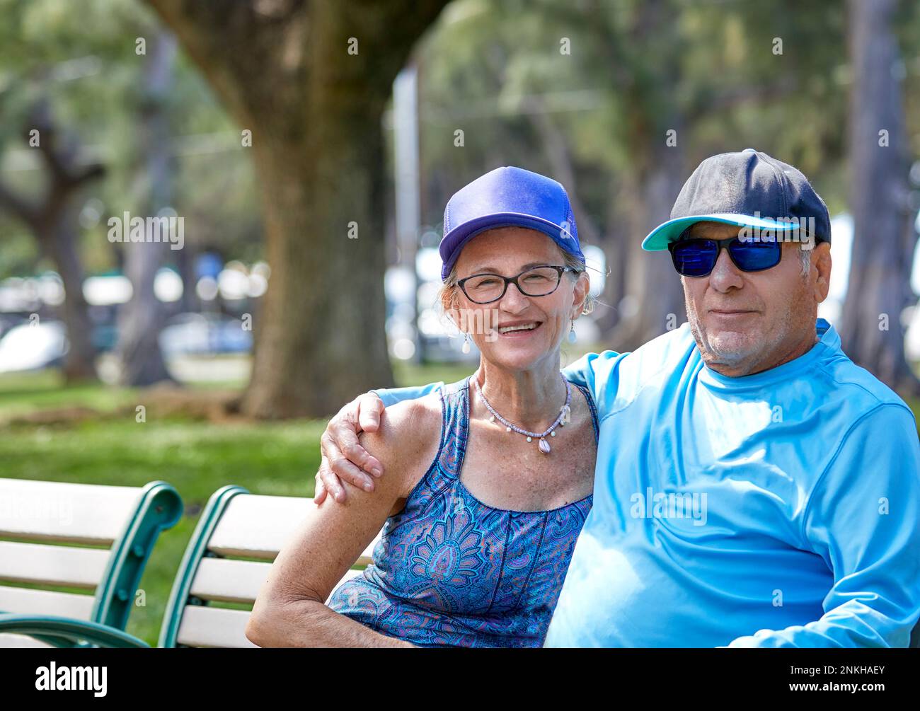 Middle age couple sitting on bench hi-res stock photography and images ...