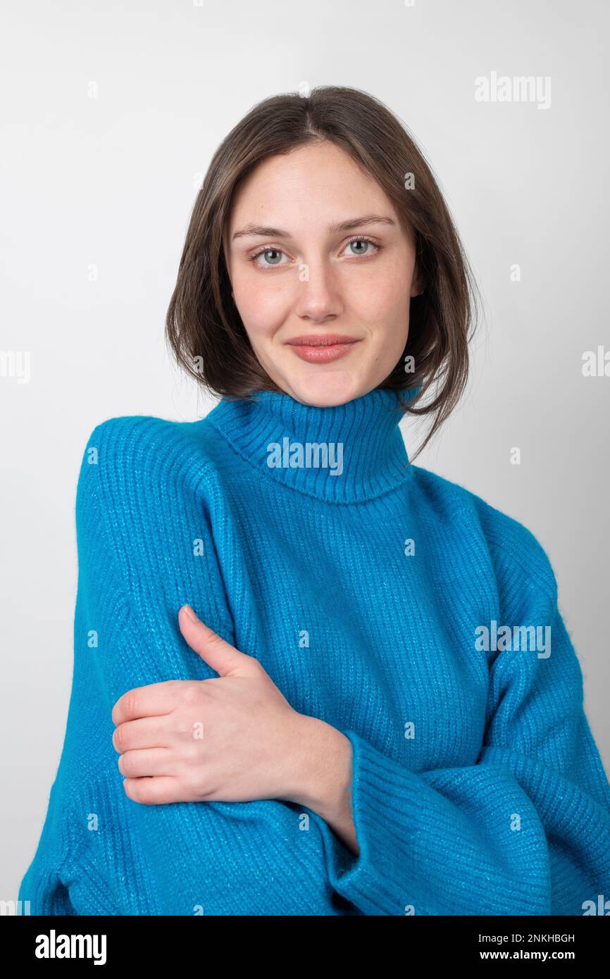 Woman wearing white turtleneck hi-res stock photography and images - Alamy