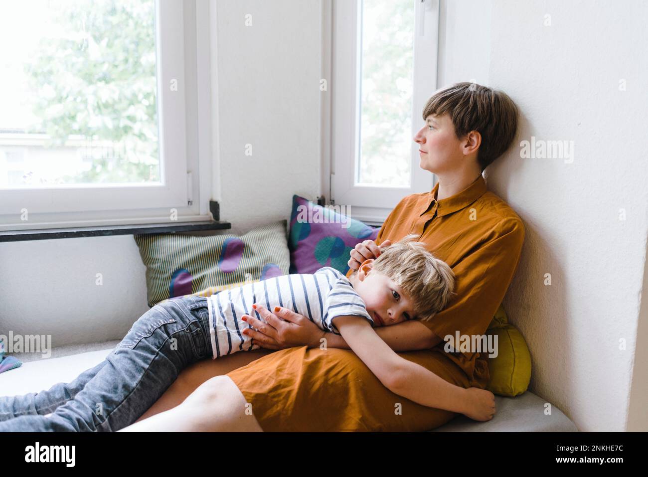 Woman spending leisure time with son at home Stock Photo