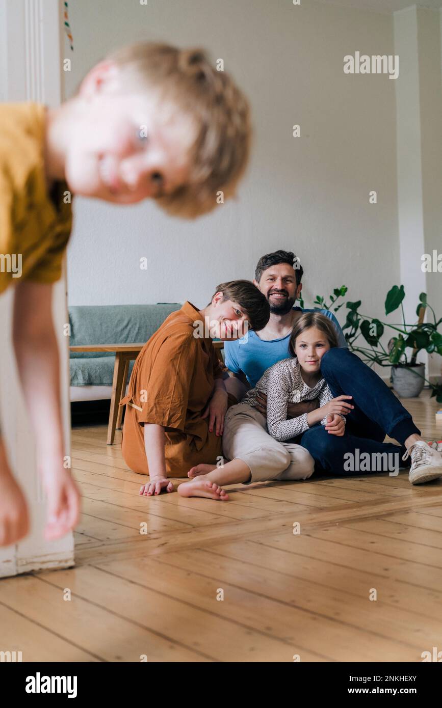 Happy family spending leisure time in living room at home Stock Photo