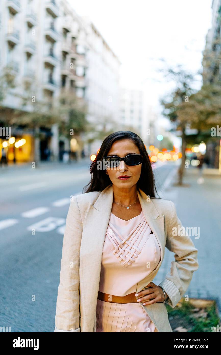 Mature woman standing street hi-res stock photography and images - Alamy