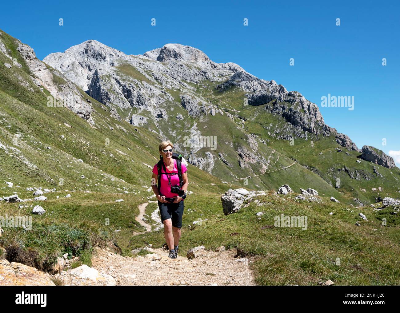 Senior woman hiking dolomites hi-res stock photography and images - Alamy