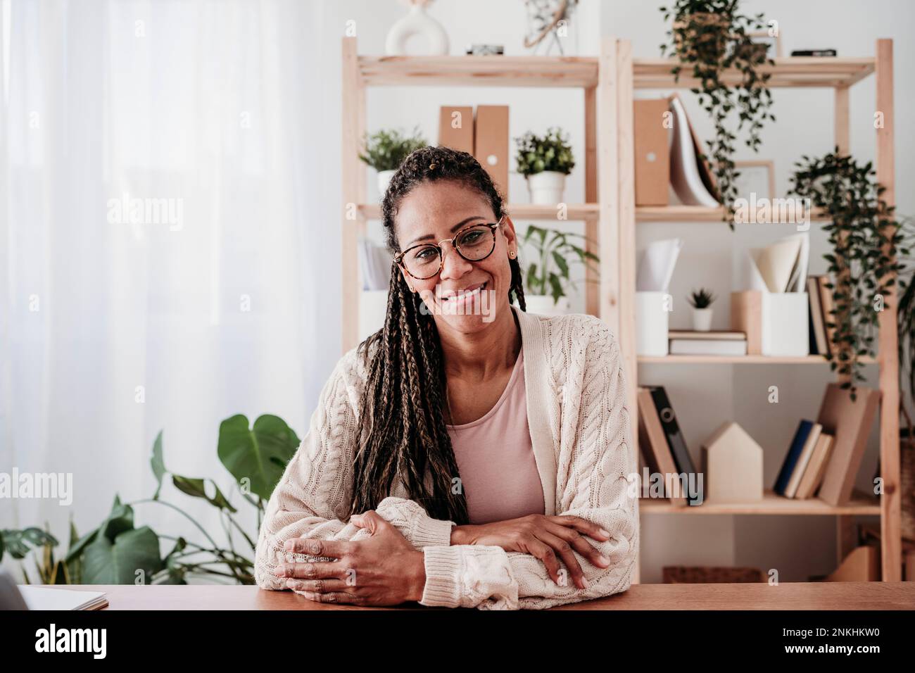 Woman wearing glasses braids hi-res stock photography and images - Alamy