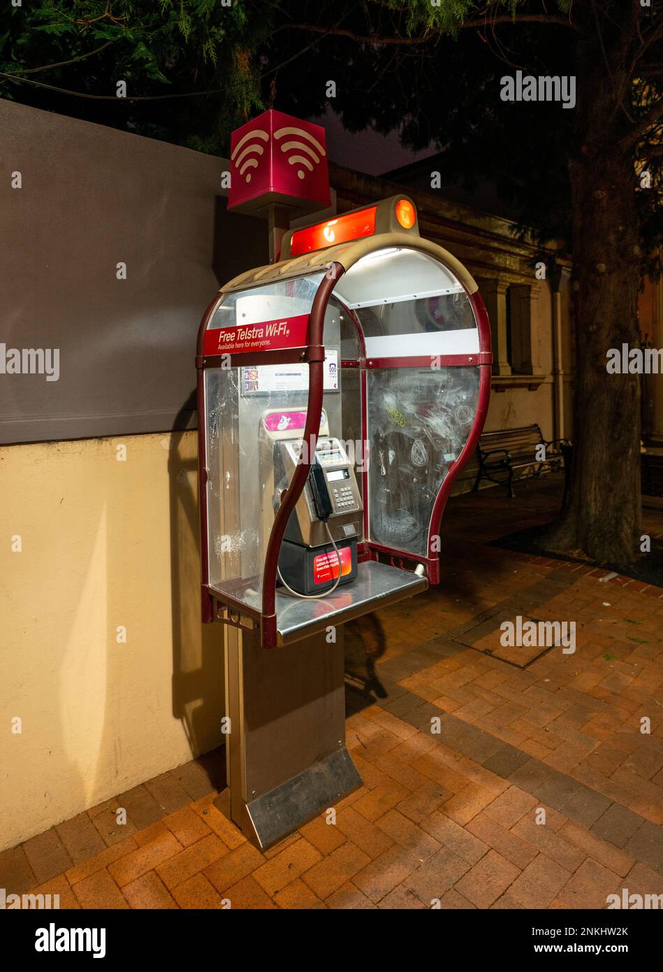 Telstra phone booth and smart payphone, now free to use,  in Armidale in new south wales, australia Stock Photo