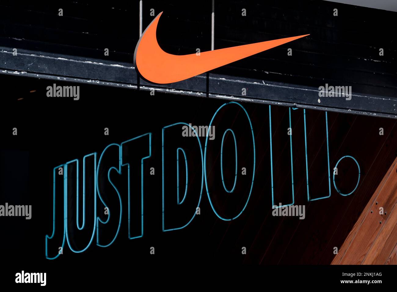A Nike store sign on March 5, 2022, in Madrid, Spain. Several companies  have closed their branches and stores in Russia after it invaded Ukraine.  Inditex announced the temporary closure of its