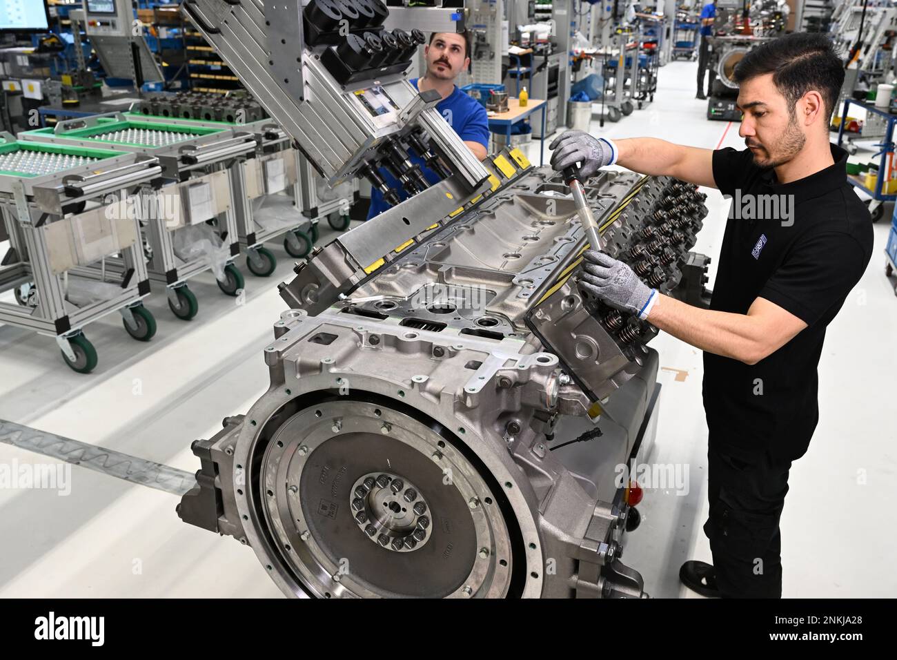 Kluftern Bei Friedrichshafen, Germany. 22nd Feb, 2023. Rolls Royce Power Systems employees assemble MTU Series 2000 engines. Rolls Royce Power Systems presents its annual financial statements on February 24. Credit: Felix Kästle/dpa/Alamy Live News Stock Photo