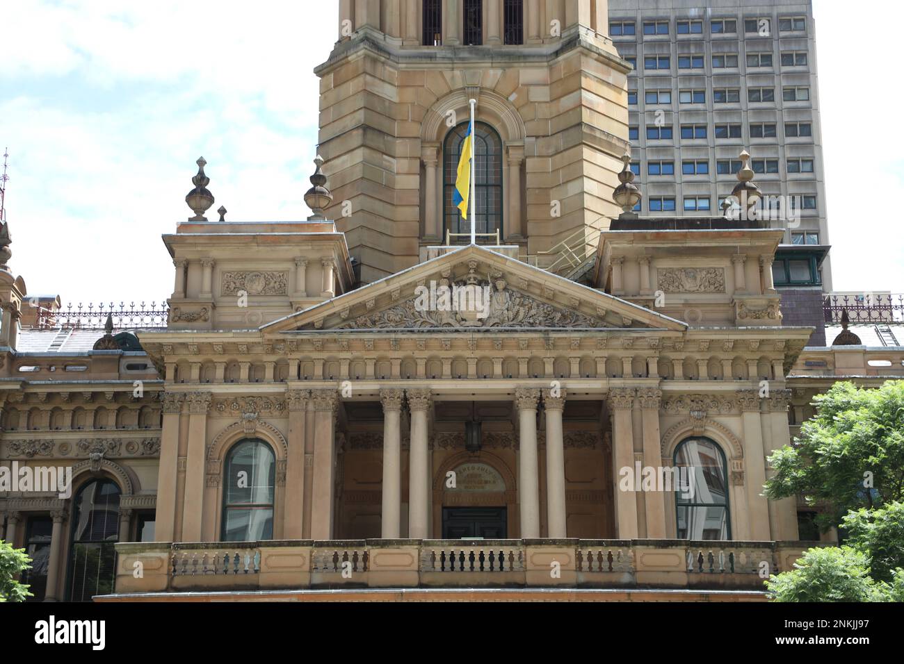 Sydney, Australia. 24th February 2023. To mark the first anniversary of the Russian invasion of Ukraine, the Ukrainian flag was flown above Sydney Town Hall in support of Ukraine. Credit: Richard Milnes/Alamy Live News Stock Photo