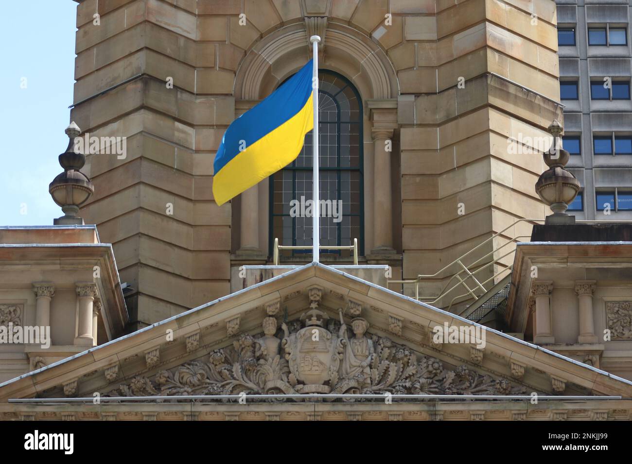 Sydney, Australia. 24th February 2023. To mark the first anniversary of the Russian invasion of Ukraine, the Ukrainian flag was flown above Sydney Town Hall in support of Ukraine. Credit: Richard Milnes/Alamy Live News Stock Photo