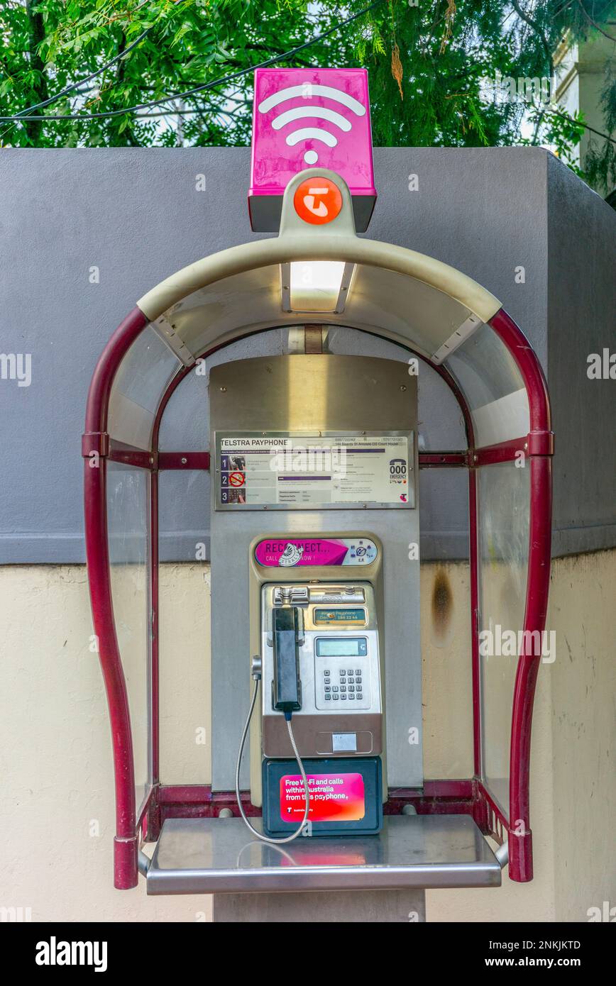 Telstra phone booth and smart payphone, now free to use,  in Armidale in new south wales, australia Stock Photo
