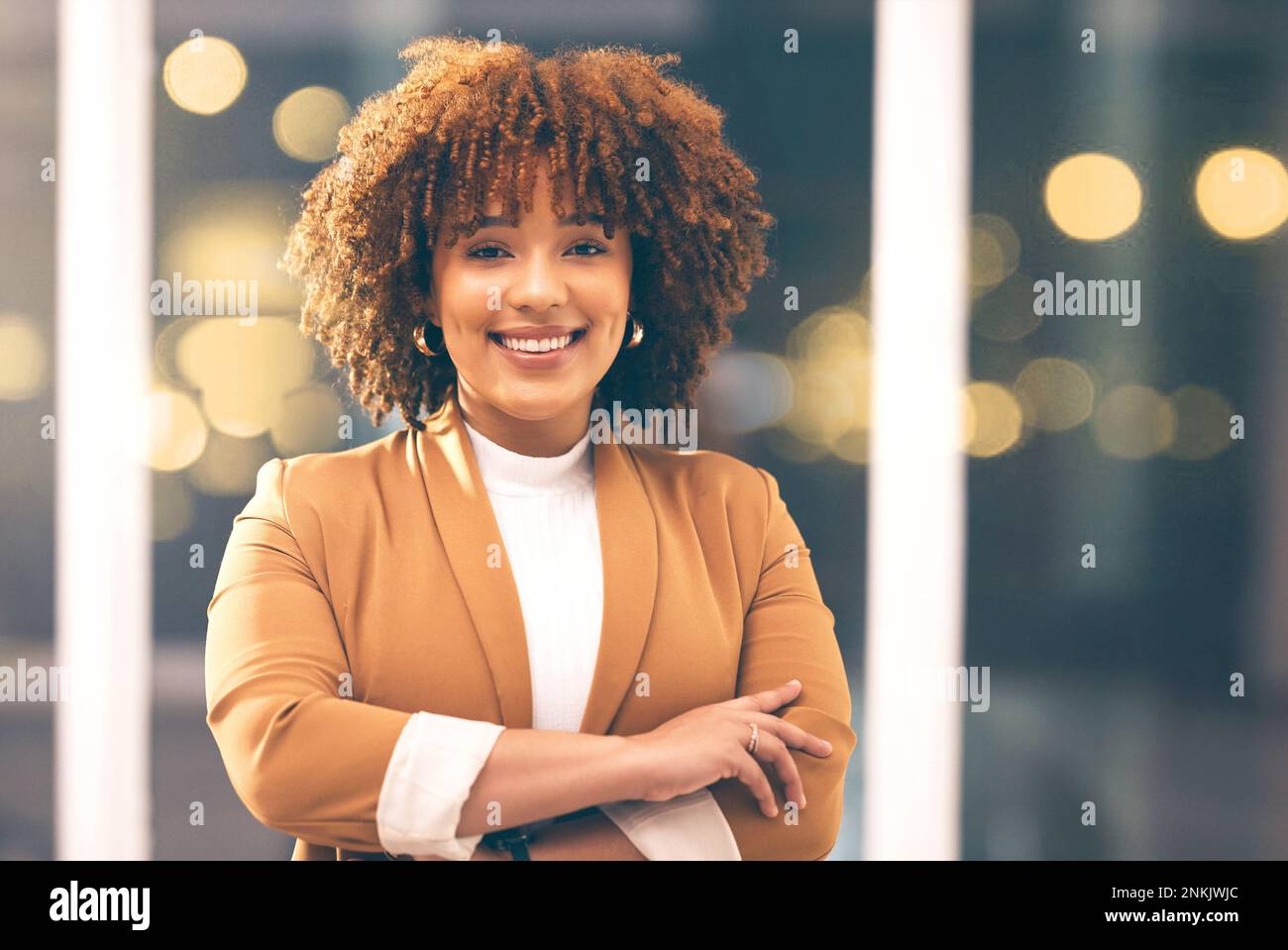 Business, smile and portrait of black woman in office at night with ...