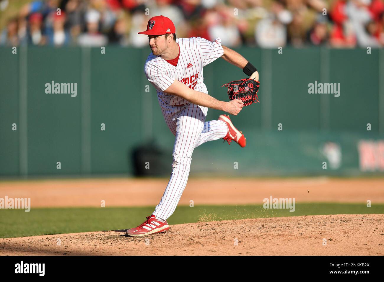 North Carolina State pitcher Baker Nelson (22) delivers a pitch during