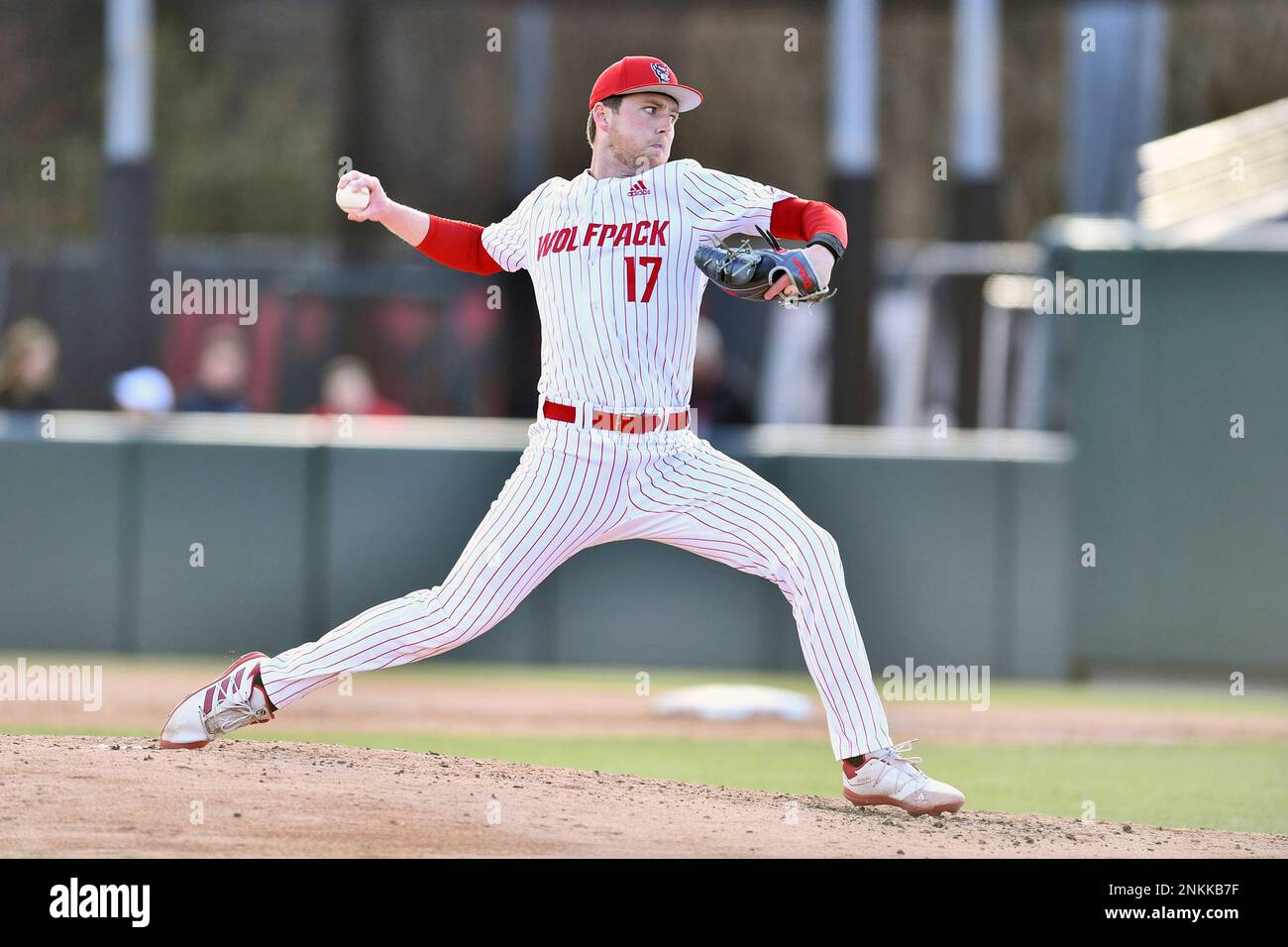 North Carolina State starting pitcher Sam Highfill (17) delivers a